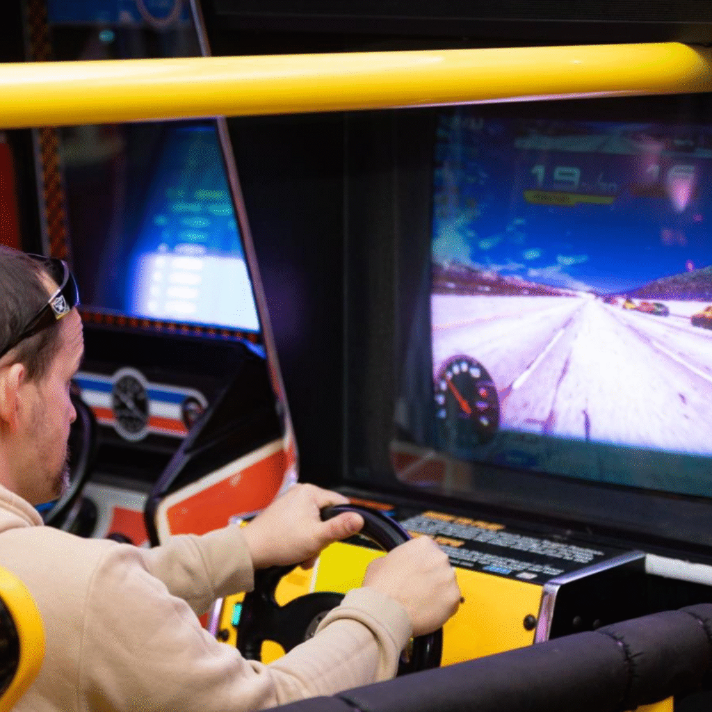 Roanoke Starcade game with person
